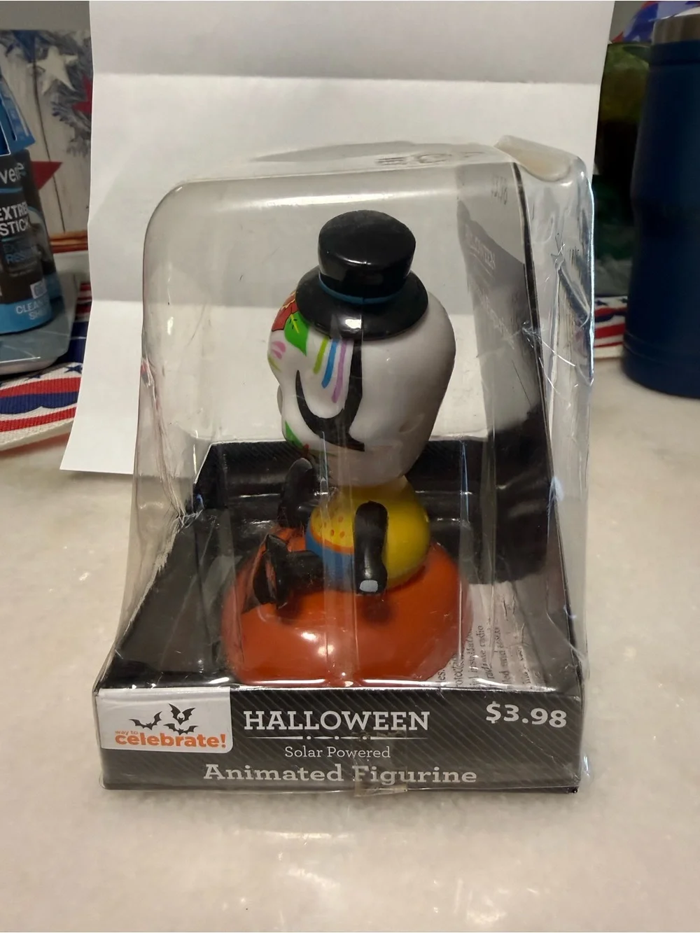 Day of the Dead Skull Solar-Powered Animated Figurine - White & Orange